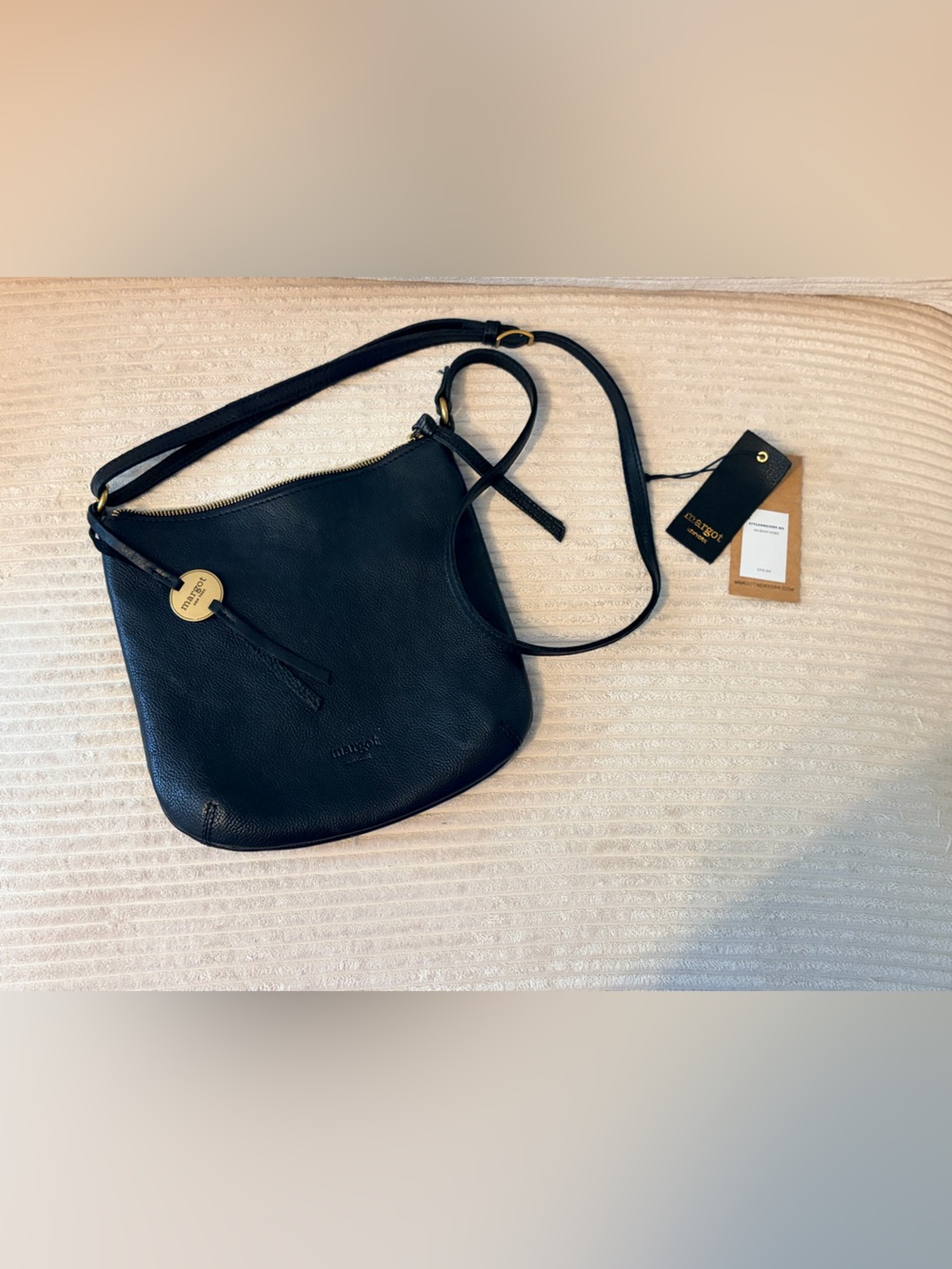 margot Black Pebbled Leather Saddle Crossbody with Gold Accent